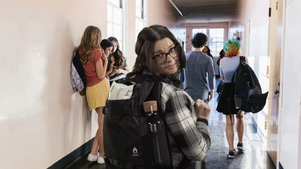 A photo of a woman walking down a college hallway with a pack of Twipes truly flushable, truly biodegradable wet wipes