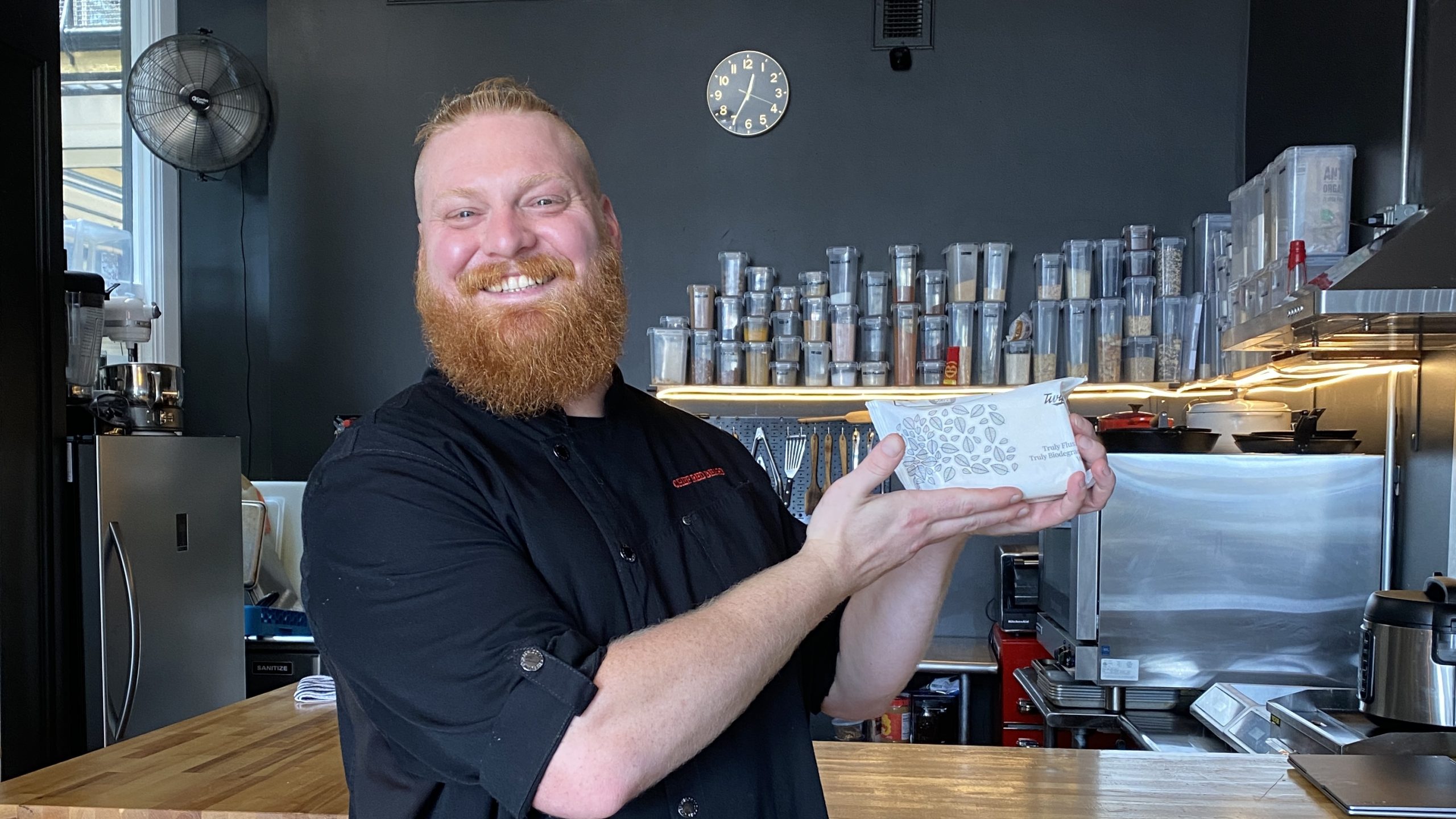 A photo of Chef Red Beard holding a pack of Twipes