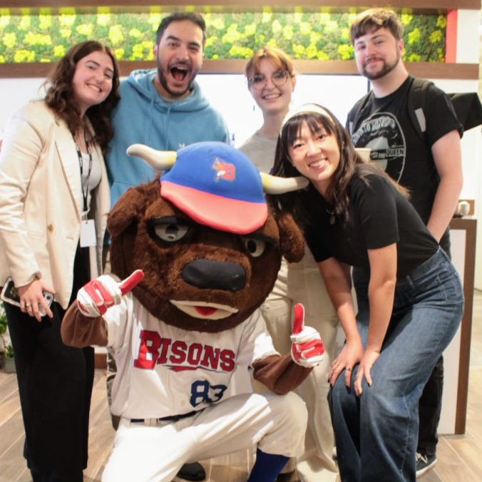 A photo of the Twipes team with Buffalo Bisons mascot Buster Bison